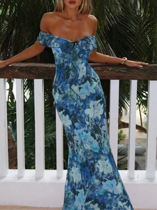 Detail of blue floral print off-shoulder dress with elegant ruffled neckline for summer