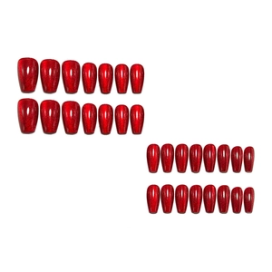 Glossy cherry red cat eye press-on nails with glitter in a long trapezoid coffin shape