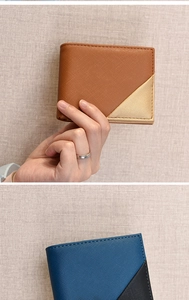 Detail of color-block men's bifold wallets in brown-gold and blue-black faux leather