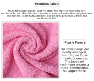 Detail of pink cotton towel featuring soft jacquard weave and thick absorbent loops