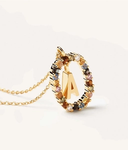 Detailed close-up of a gold S925 silver necklace with multi-color gems and letter A pendant