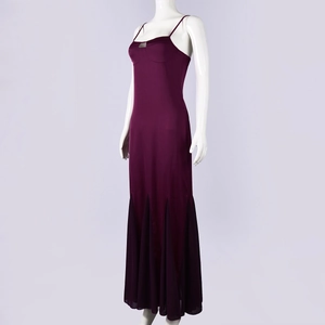 Detail view of the sleek mermaid hemline and flowy stitching on this purple camisole maxi dress