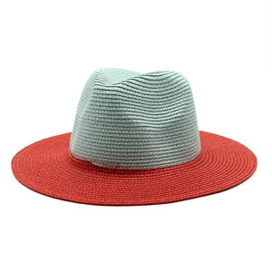 Detailed close-up of woven paper straw texture on a two-tone panama jazz sun hat