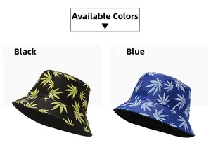 Detail view of double-sided bucket hats in black and blue with maple leaf print pattern