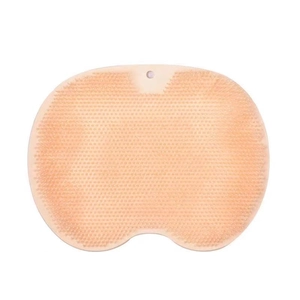Nude silicone foot massage mat with dense bristles and hanging hole for shower use