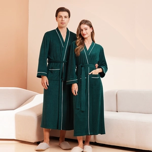 Couples dark green towel fabric bathrobe set with white piping and waist tie belt