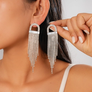 Silver tassel earrings with cubic zirconia jellyfish fringe shown on model