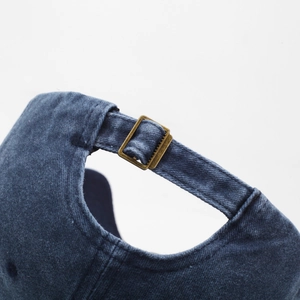 Vintage navy blue washed cotton baseball cap with adjustable antique bronze metal buckle