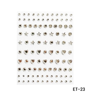 Macro detail of ET-23 clear acrylic rhinestone sheet with stars, hearts and round shapes