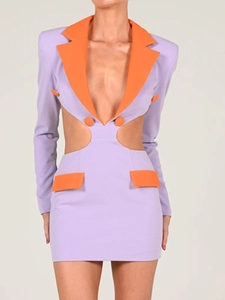 Detail of color-block blazer dress with waist cut-outs in purple and orange