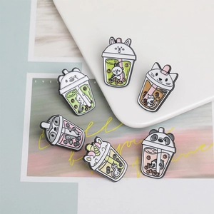 Set of 6 cute animal enamel pins featuring bunny and panda motifs with pearl milk tea design