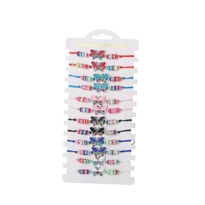 Set of 12 braided bracelets with colorful clay beads and rhinestone butterfly charms