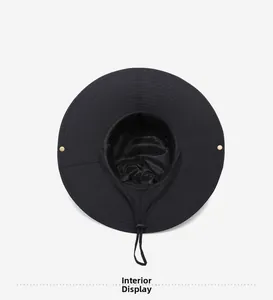 Detail view of the black sun hat interior showing inner lining and windproof rope