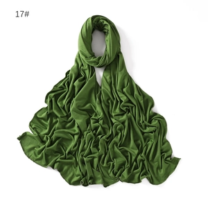 Detail of dark green modal cotton jersey hijab showing soft texture and fine stitching
