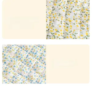 Close-up of quilted floral fabric showing fine stitching and soft padded material