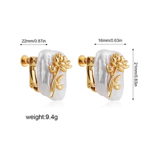 Detailed view of baroque pearl earrings with gold floral decor and size measurements