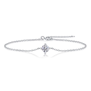 Minimalist silver chain bracelet with round-cut moissanite stone on white background