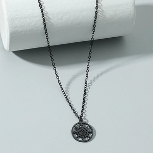 Compass pendant stainless steel necklace for men on minimalist display stand