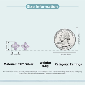 Detailed size comparison of lilac clover stud earrings in 925 silver with a quarter coin