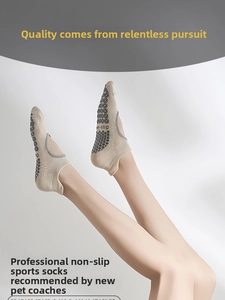 Detail of beige cotton yoga socks with anti-slip honeycomb grip and open back design