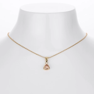 Detail of S925 silver necklace with champagne triangular gemstone in golden finish