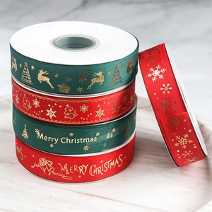 Christmas grosgrain ribbons with gold foil deer and tree patterns for festive gift wrapping