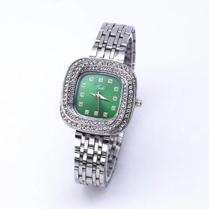 Elegant silver square watch for women with green dial and sparkling diamond-set bezel