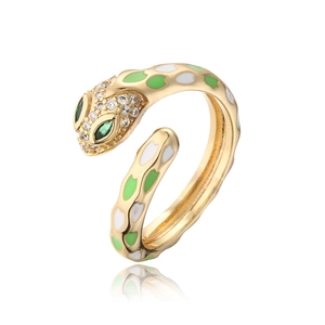 Detail of snake ring featuring green enamel and white zircon stones in 18k gold plating
