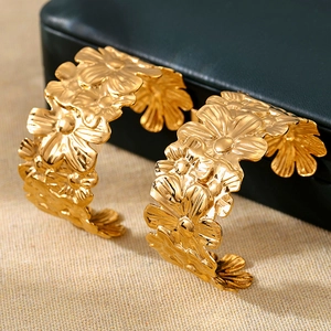 Elegant 18K gold-plated stainless steel hollow flower hoop earrings for women