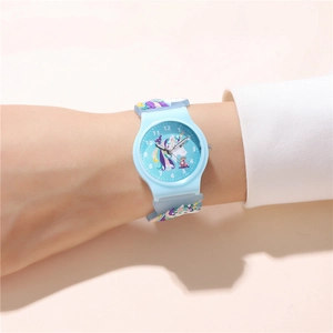 Detailed close-up of a blue unicorn kids watch with 3D embossed rainbow strap features
