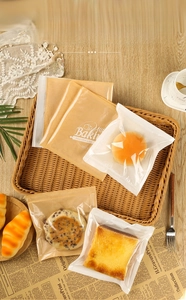 Detailed view of greaseproof kraft paper toast bags with a transparent window for baking