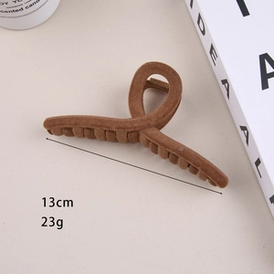Detail of 13cm brown velvet shark hair claw clip showing dimensions and plush texture