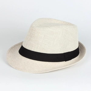 Detailed view of linen fedora hat featuring woven texture and a black contrast band