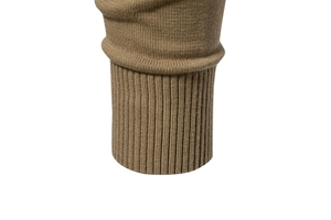 Detailed macro view of the brown ribbed knit cuff on a men's cotton pullover sweater