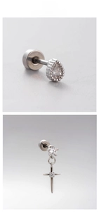 Detail of titanium steel stud earrings with droplet zircon and cross star screw back