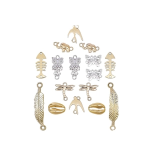 Set of 18 vintage alloy charms including swallows and butterflies in gold and silver finish