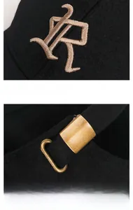 Details von Stickereien und verstellbarer Metallschnalle an einer Winter-Baseballkappe