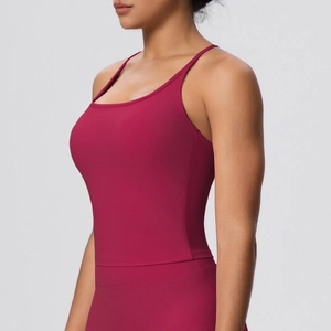 Detail view of burgundy racerback sports bra with high-elasticity matte fabric