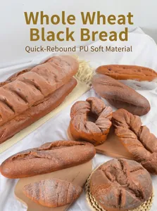 Macro shot of soft PU rye bread models and fake baguette props for realistic food display