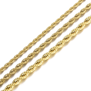 Detail of high-polished gold stainless steel rope chain with twisted texture and luster