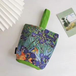 Artistic Van Gogh Iris bucket handbag with bright green handle and canvas texture