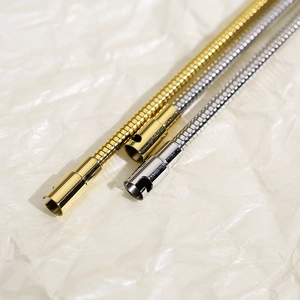 Minimalist flexible stainless steel wire bracelets in gold and silver metallic finish