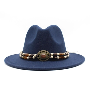 Navy blue wool felt fedora hat with vintage beaded band and decorative gemstone