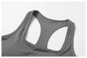 Close-up of racerback sports top with double-needle stitching and matte elastic fabric