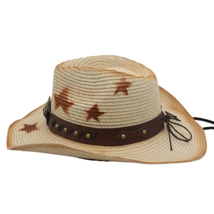 Detail of straw cowboy hat featuring dark star patterns and studded brown leather band