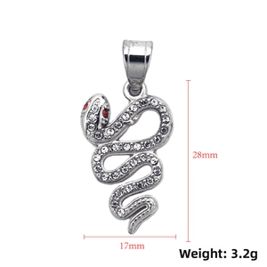 Silver cobra pendant with crystal inlay and red gemstone eyes measuring 28mm by 17mm