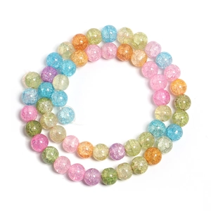 Macro shot of colorful crackle glass beads in spiral pattern for jewelry making
