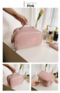 Detailed views of a pink multi-layer makeup bag with gold zippers and sturdy handle