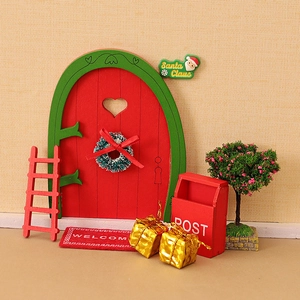 Miniature wooden Christmas elf door set with mailbox, ladder and festive decor