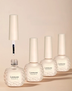 Detail of 10ml nail gel bottle with wave texture and smooth brush applicator